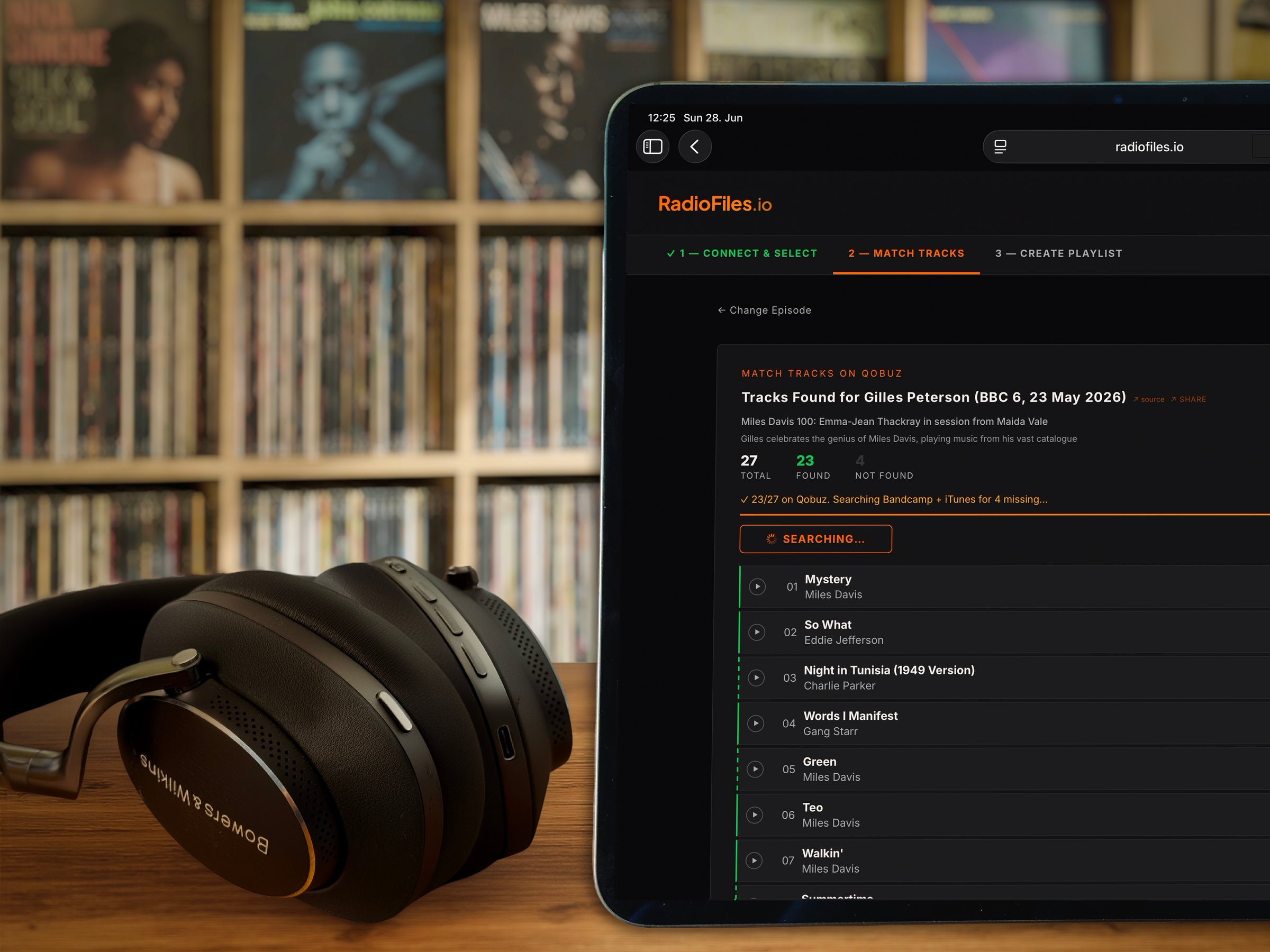 RadioFiles displayed on iPad with vinyl collection and Bowers & Wilkins headphones in foreground