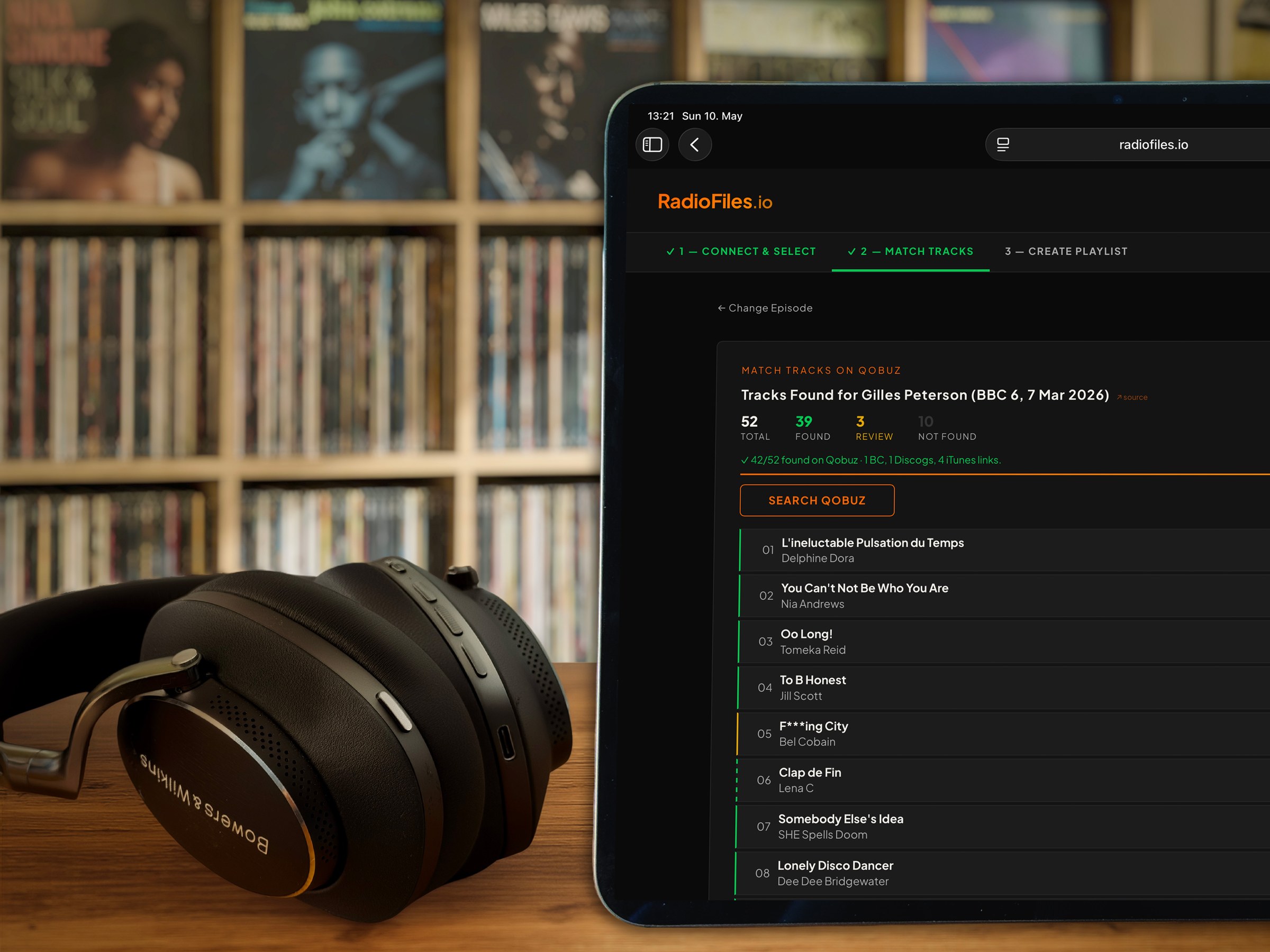 RadioFiles displayed on iPad with vinyl collection and Bowers & Wilkins headphones in foreground